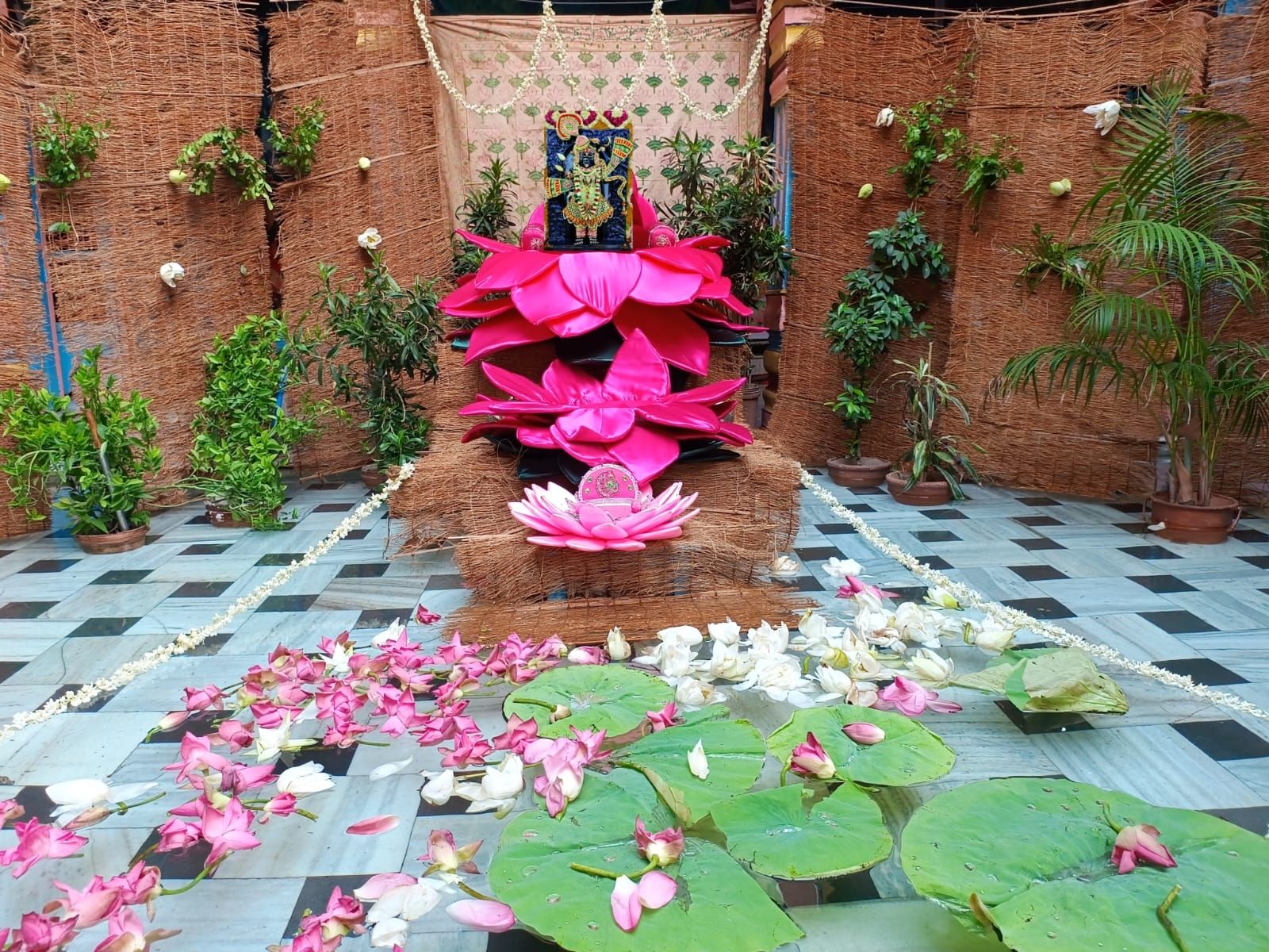 Kamal Sarovar Manorath in Lakherapura Shreeji Temple: Pink Craft wearing Prabhu Shrinathji, crown made with lotus flowers